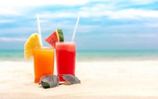 Colorful,Refreshing,Cold,Tropical,Fruit,Punch,Drinks,With,Sunglasses,In