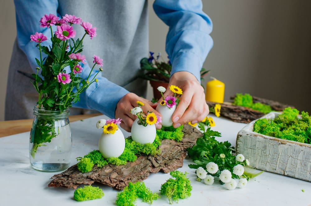 Woman,Preparing,Easter,Decoration,With,Eggs,And,Flowers,Inside,It
